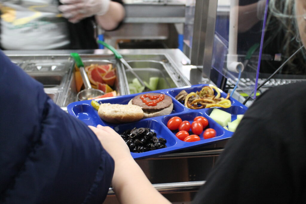 School cafeteria tray with various food items