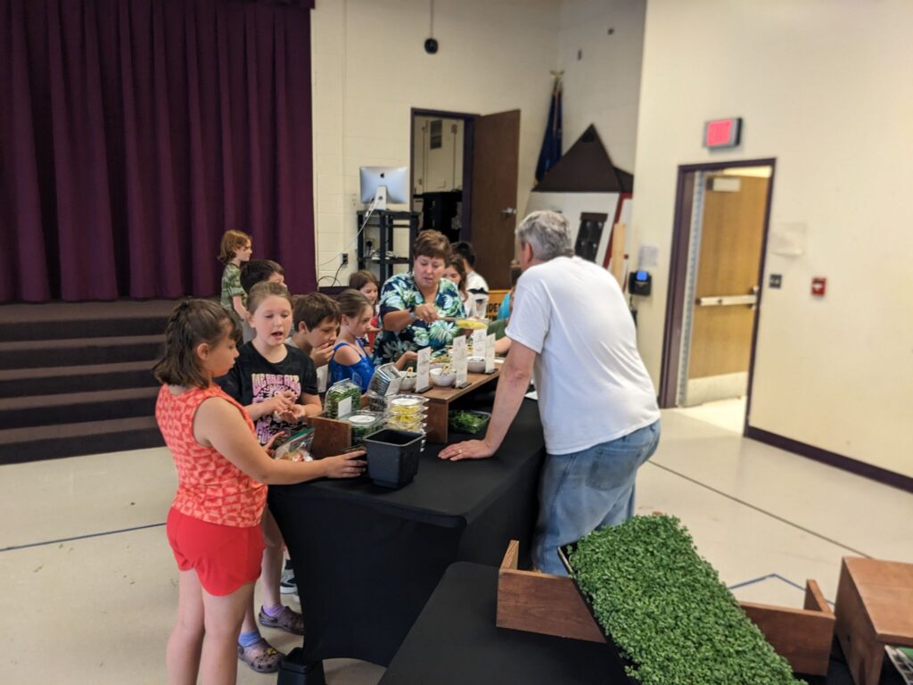 Children and adults at a food event