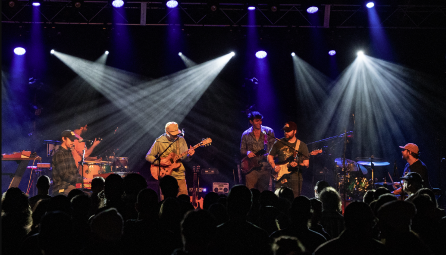 Live band performing under stage lights